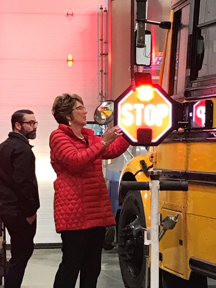 US Congresswoman Jackie Walorski inspecting the new LED bus lighting on our school bus stop arm